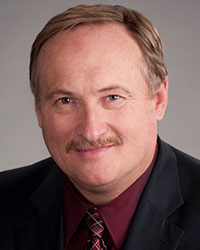 Brian Lewis, Past President & CEO of MEDEC